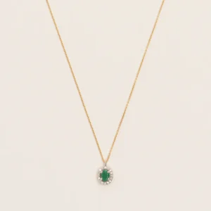 Wouters&Hendrix – 18K gouden ketting met ovale smaragd en diamanten