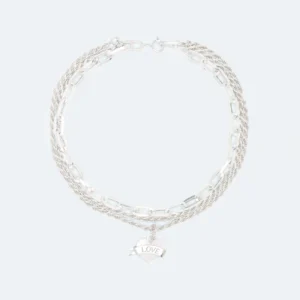 Wouters&Hendrix - gelaagde statement ketting met tattoo hart hanger "love".