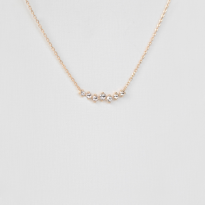 Céline D'aoust - 14K gouden halsketting met zeven ronde rosecut diamantjes