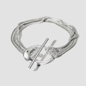 Lore Van Keer - verto armband met sculpturaal middenstuk en T-vormige sluiting zilver